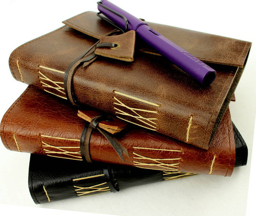 Leather Aussie Travel Pocket Journals are handcrafted in Australia by a book lover. Soft and supple with the hand stitched pages being stronger than glue. The leather pocket journal can go where hard cover books just can't take it. Available in a range of leathers.