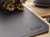Black leather monogrammed desk mat