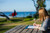 Inspiration by the beach with a leather desk mat on the picnic table. Handmade in Australia.