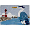A bold blue and white heron stares off into the distance, watching the lighthouse in its grandeur. This coastal themed Jellybean® accent rug is machine washable with a simple color combination that will work well in a variety of spaces. Crafted of polyester, this throw rug is suitable for indoor and outdoor use.