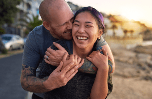 Man embraces woman, both aren't thinking of smoking