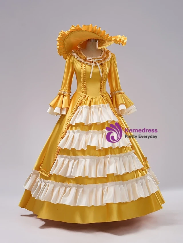 Yellow Satin Gown – Detail View Yellow satin Baroque gown detail showing its long-sleeved vintage styling