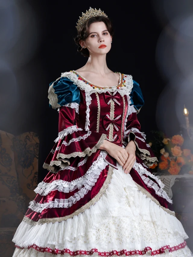 Detail view of the blue satin vintage dress with long sleeves, lace and bow embellishment