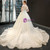 White Ball Gown Pearls Cap Sleeve Wedding Dress