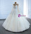 White Tulle Pearls Long Sleeve Wedding Dress
