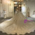 Champagne Sequins Pearls Long Sleeve Backless Wedding Dress