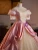 Close-up of the tiered tulle ruffles and waist ribbon details