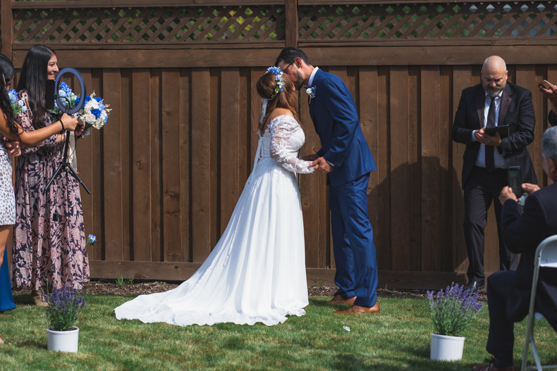 The Lace Wedding Dress That Survived Grass, Stairs, and No Alterations