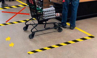 Marking tape in use in a floor