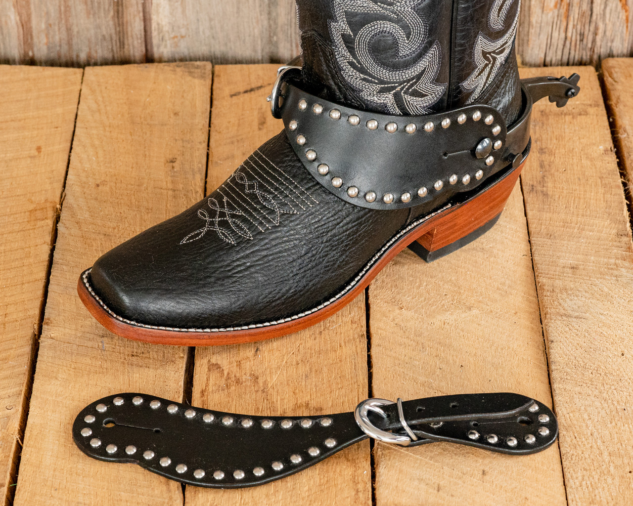 black cowboy boots with spurs