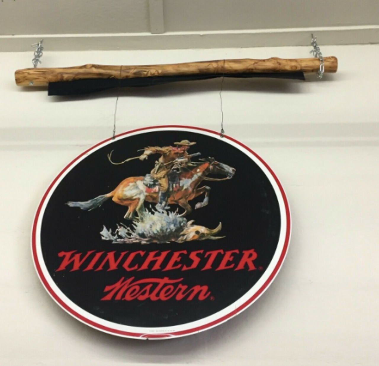 A Collectible Vintage Winchester Sign