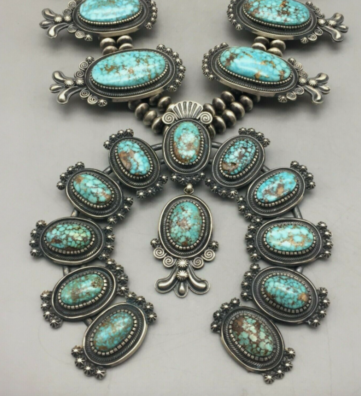 Turquoise Stamped Squash Blossom Pendant – Picayune Cellars & Mercantile