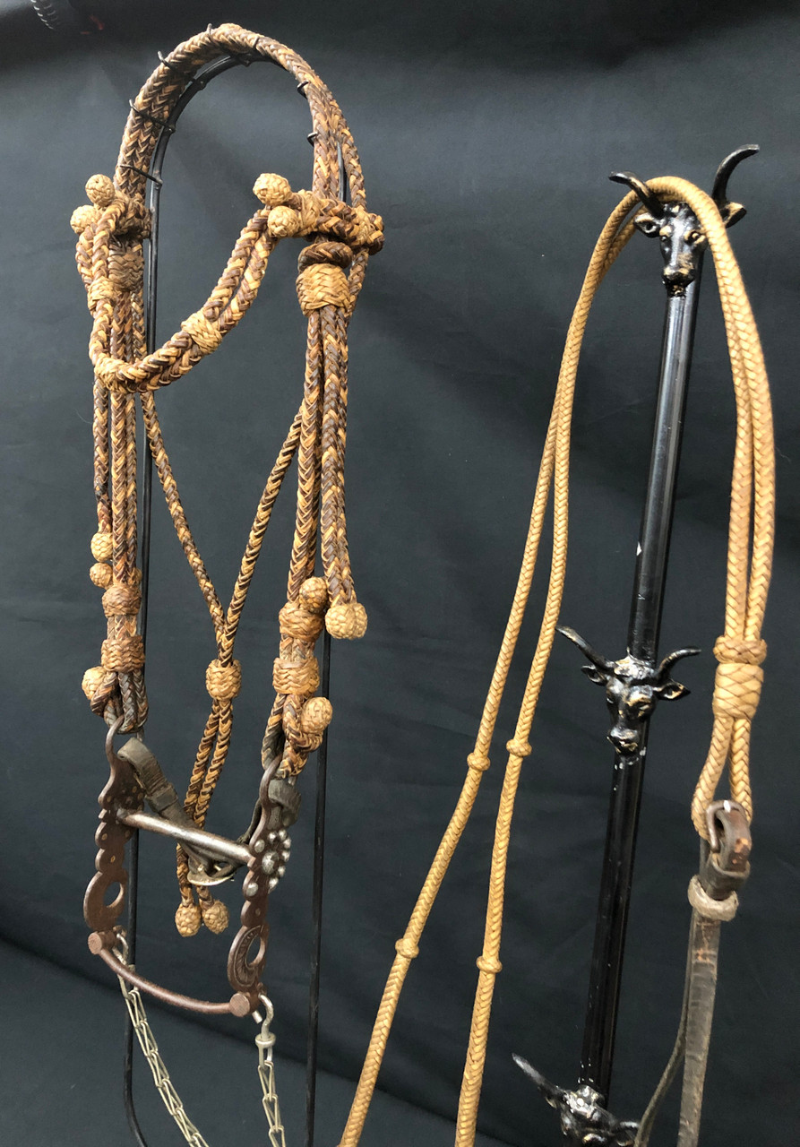 A Great Old Rawhide/Calfskin Braided Bridle with Kissing Bird Bit
