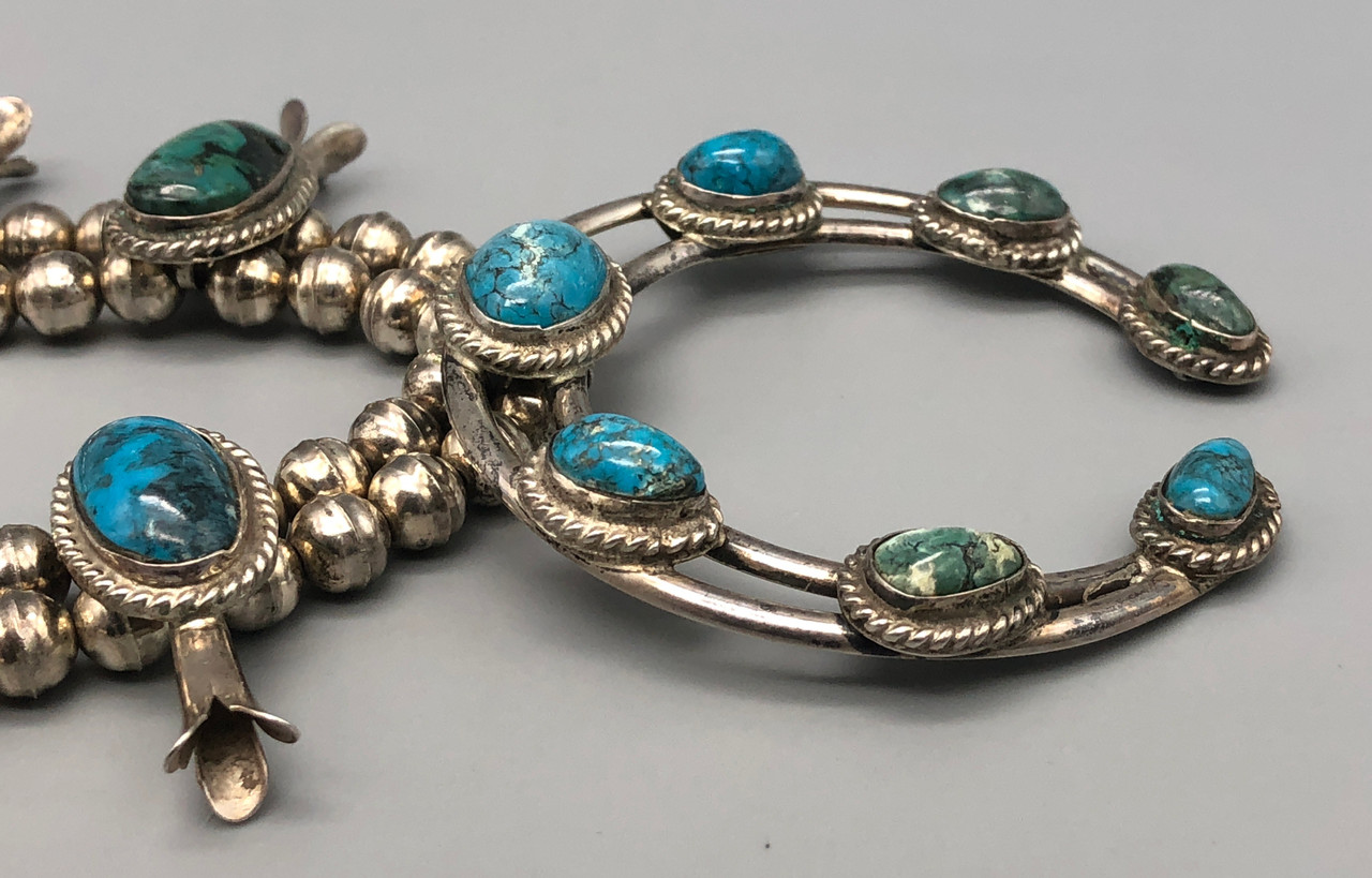 Seventeen Stone Turquoise and Sterling Silver Squash Blossom Necklace