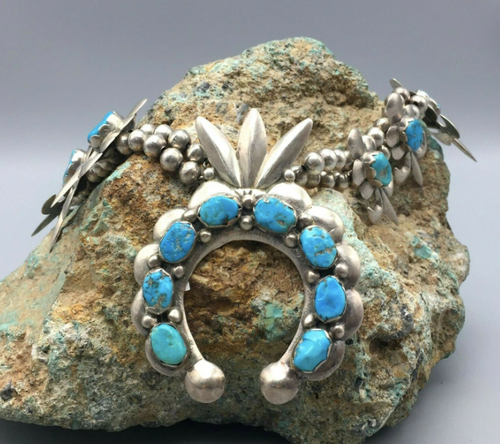 Sand casted sterling silver and turquoise squash blossom