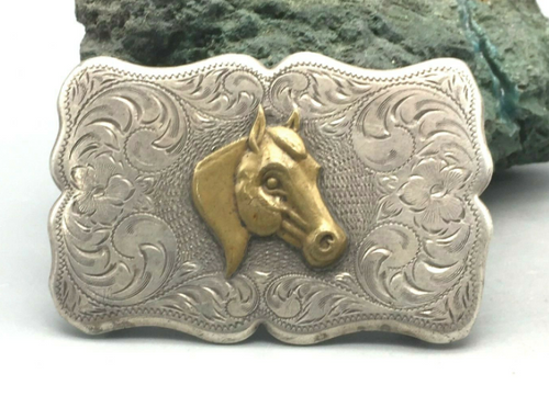 Silver engraved belt buckle with brass horse head