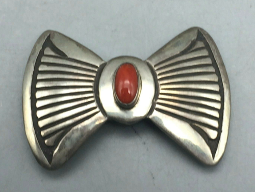 Butterfly concho with coral setting