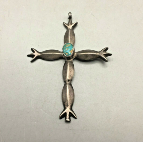 Sandcasted cross with turquoise