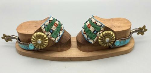 Turquoise inlay spurs with beaded straps