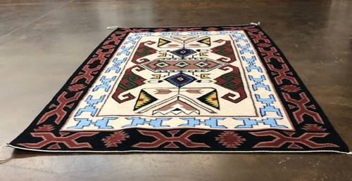 Navajo textile from the Teec Nos Pas area, weaver