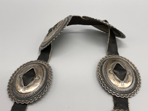 Kirk Smith, sterling silver concho belt, hand stamped designs