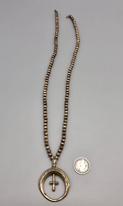 vintage naja necklace with cross, hand stamped designs, sterling silver, strung on a coated wire