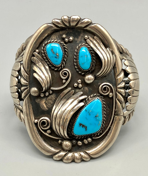 vintage three-stone turquoise and sterling silver bracelet, turquoise cabochons in handmade sawtooth bezels, darkened silver