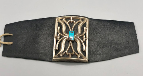circa 1950-1960s sterling silver and turquoise Ketoh, singular turquoise cabochon, fine piece of black leather (bow guard)
