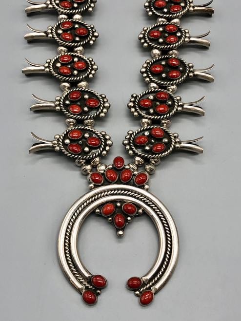 coral cluster squash blossom necklace, large naja with a small cluster of coral cabochons, accents of twisted wire and dots
