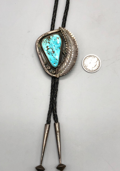 vintage turquoise and sterling silver bolo tie, large turquoise cabochon, silverwork of twisted wire, leaf applique, hand stamped designs