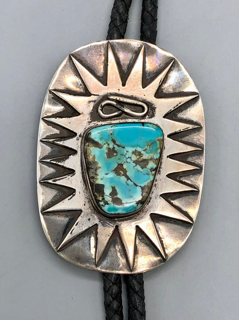 turquoise and sterling silver bolo tie, remarkable silverwork, braided black leather cord