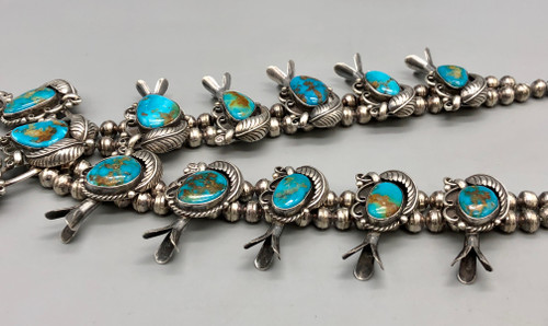 turquoise and sterling silver squash blossom necklace, leaf applique, loops, dots of silver, twisted wire, foxtail wire