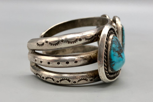vintage hefty three-stone turquoise bracelet, handmade sawtooth bezels with twisted wire and silver dot accents, hand stamped designs