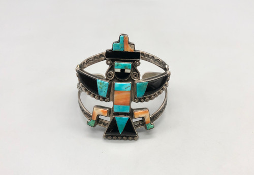 circa 1950s era Knifewing inlay bracelet, inlay of turquoise, spiny oyster, mother of pearl, onyx, hand stamped designs, stamped silver dots, and loops of silver