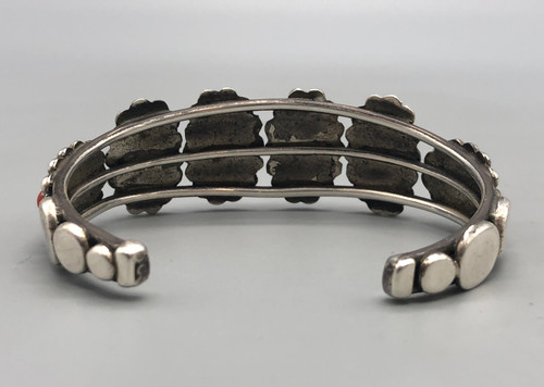 vintage six-stone coral bracelet, six coral cabochons, handmade sawtooth bezels, three wire terminal