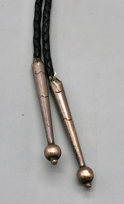 vintage multi-stone inlay eagle dancer themed bolo tie, inlay of mother of pearl, onyx, coral, turquoise, black braided leather cord, custom sterling silver tips