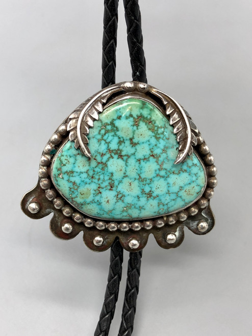 vintage turquoise bolo with great turquoise, sterling silver slide with a great turquoise cabochon with accents of leaf and silver dot applique