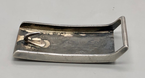 1960s era bear paw design overlay belt buckle by Hopi artist, Nathan Fred JR., darkened silver background, sterling silver
