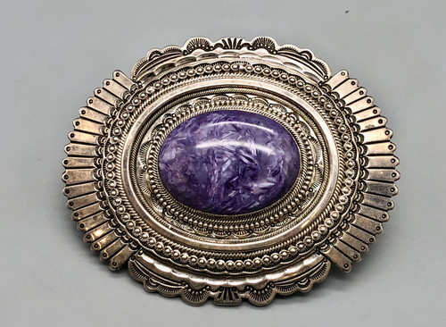lepidolite and sterling silver belt buckle by Navajo artist, Wallace Yazzie, Jr., intricate hand stamped designs, filework