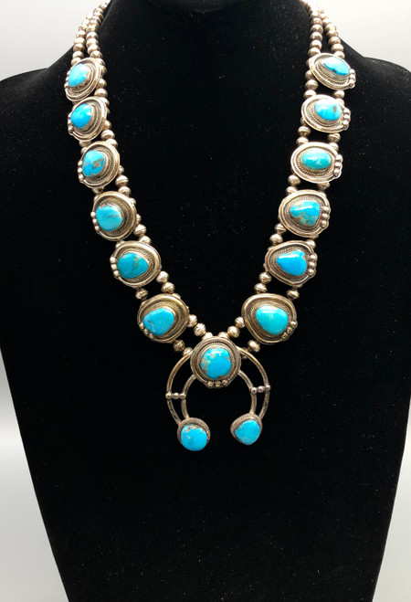circa 1970s turquoise and sterling silver squash blossom necklace, silver dots and loops of twisted wire, sterling silver, coated wire