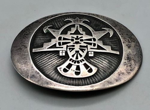 Hopi overlay belt buckle by Bernard Dawahoya, bold overlay of a kachina bust