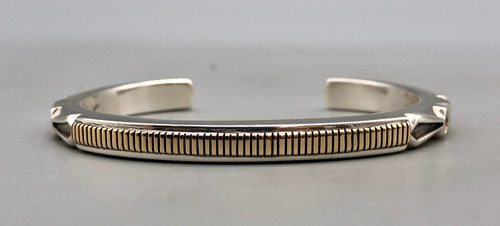 sterling silver and gold bracelet by Jennifer Curtis, geometric designs