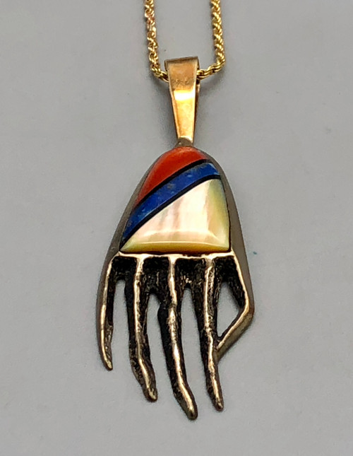 gold and sterling silver necklace by Preston Monongye, bear claw with an inlay of coral, lapis, onyx and shell