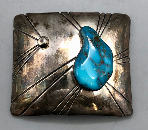 turquoise cabochon, with lovely smooth silverwork