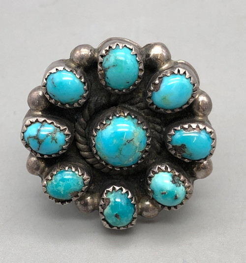 nine wonderful round turquoise cabochons in a single cluster