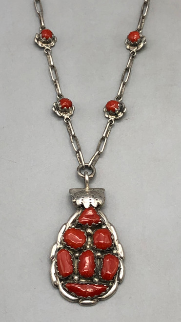 teardrop shaped pendant with seven coral cabochons, handmade sterling silver chain