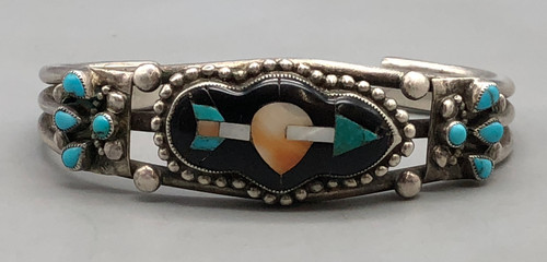 1940s inlay design, cupids arrow design, mother of pearl, turquoise and spiny oyster inlay, attributed to John Gordon Leek