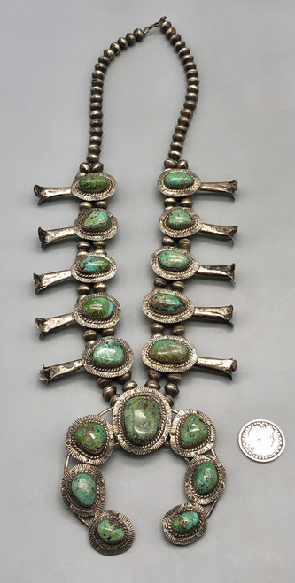 Bobby Etsitty, seven green turquoise, intricately hand stamped, foxtail wire, Navajo