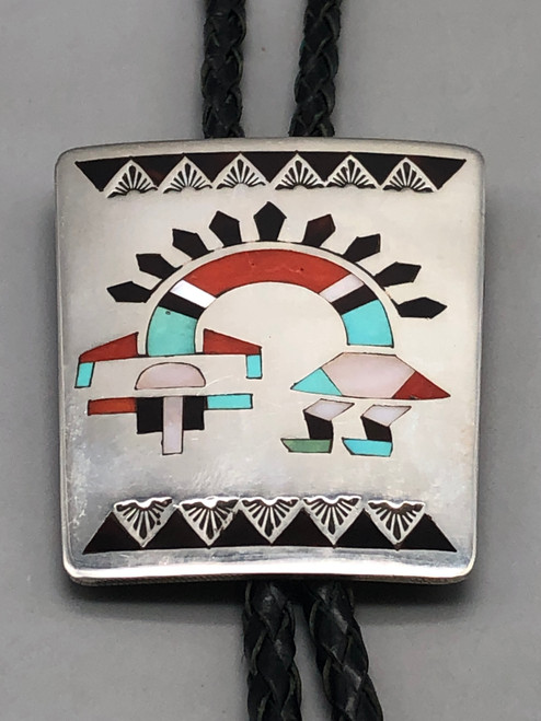 Rainbow Man, Natachu, turquoise, coral, onyx, and mother of pearl, Zuni