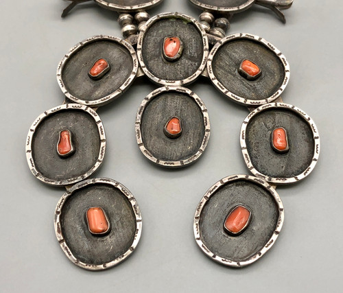 coral and sterling silver, darkened silver background, hand stamped designs, 12 blossoms, vintage